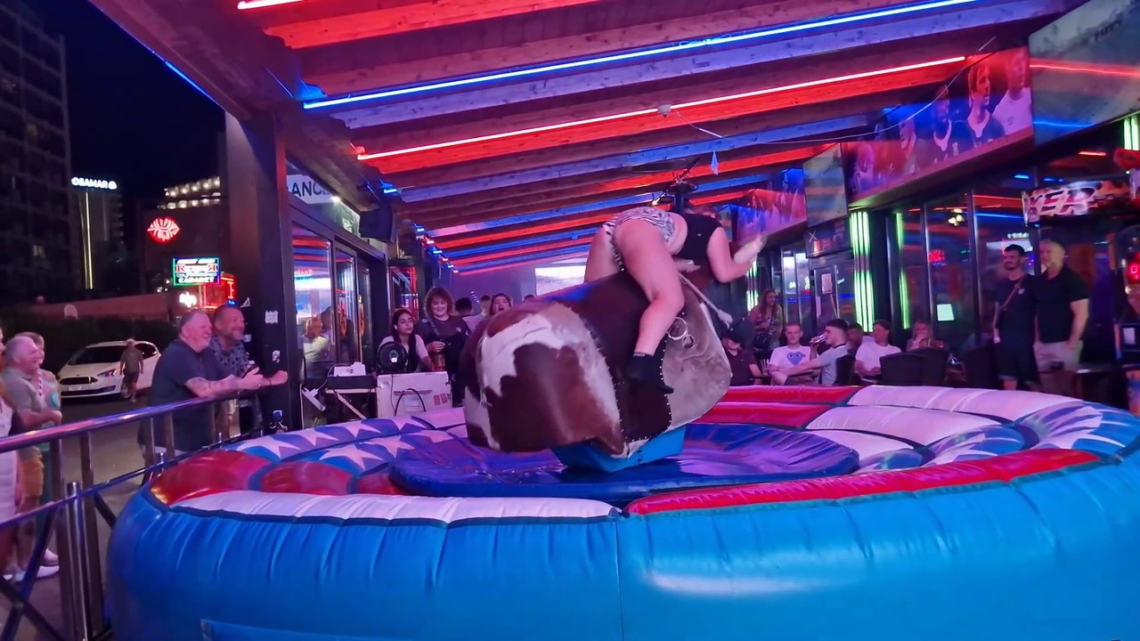 OMG  Funny Girl FAIL on a Ride Bull in Benidorm! Mechanical Bull Spain