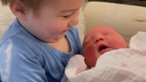 Love at First Hold: Little boy embraces his baby sister's arrival