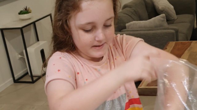 Little girl welcomes her new twin siblings with open arms