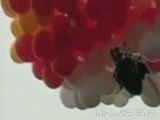 Priest Carried Away By Balloons and Is Missing