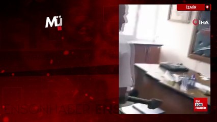 İzmir'de müdür odasına balyozla dalıp masayı parçaladı