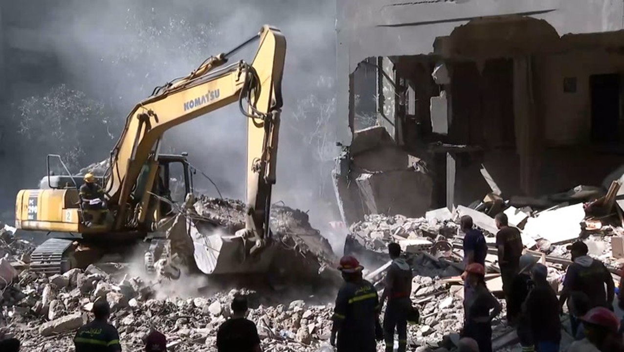Rescuers search through rubble after Israel’s strike on central Beirut kills 22