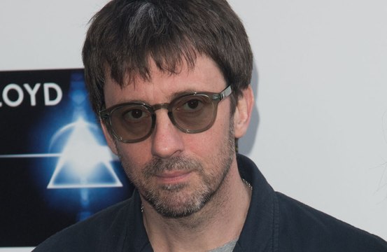 Blur guitarist Graham Coxon is pleased that Oasis are reuniting