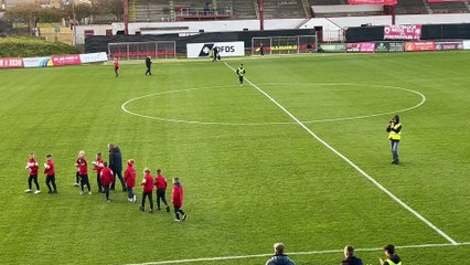Pre-match trophy parade by Portadown Youth players at Shamrock Park