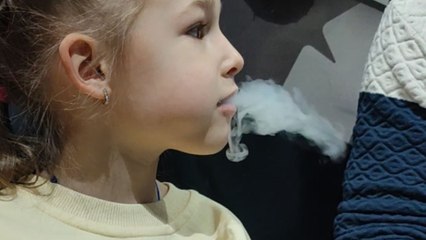 Curious girl is so-not-impressed after getting ice-cold 'Dragon Breath'