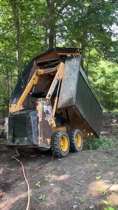Dozer Falls Into Pit