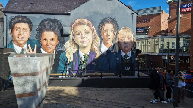 Badgers smoking garden awning that ‘split’ the Derry Girl’s mural in half has been removed