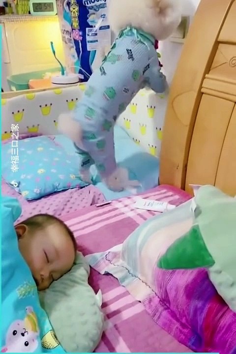 Cute pupie caring baby