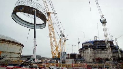 Hinkley Point C's reactor building number two sees its final steel ring liner lifted into place.