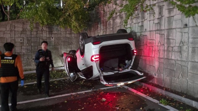 만취 운전하다 울산경찰청 주차장에 추락...불구속 입건 / YTN