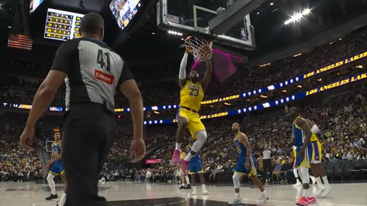 LeBron sets the pace with early dunk