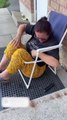 Woman Gets Stuck in Lawn Chair