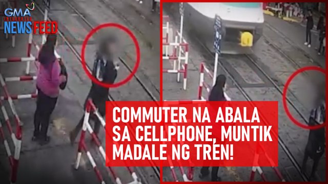 Commuter na abala sa cellphone, muntik madale ng tren! | GMA Integrated Newsfeed