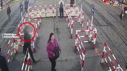 A man glued to his phone walked in front of a train