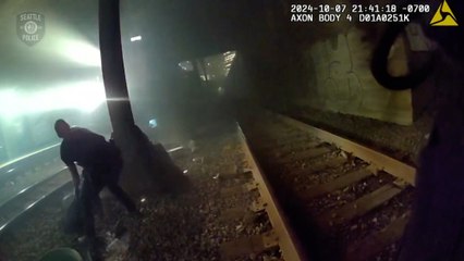 Police rescued an injured man from an oncoming train