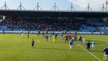 Coleraine fans celebrate win at the Ballymena Showgrounds