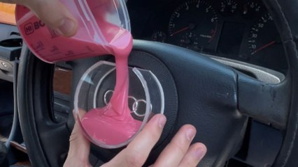 Boy makes an Audi logo keychain using a handmade silicone mold