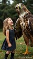 His child plays with a huge eagle
