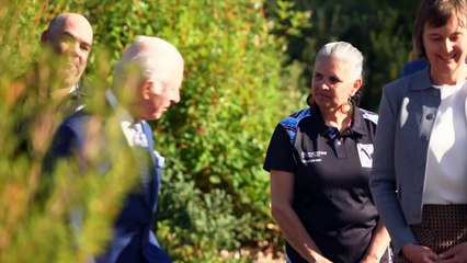 King Charles plants a tree during Australian visit