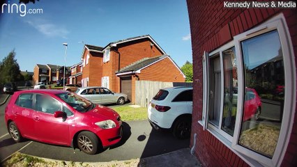 Dad tries to park on woman's drive during school run