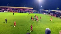 Crawley Town players celebrate victory over Lincoln City