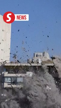 Building collapses in southern Beirut after missile strike