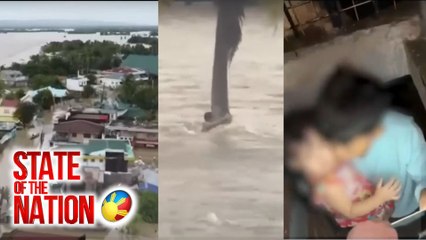 Puno ng niyog, kinapitan ng isang lalaki para hindi matangay ng baha | SONA