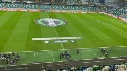 Larne vs Shamrock Rovers - teams coming out.