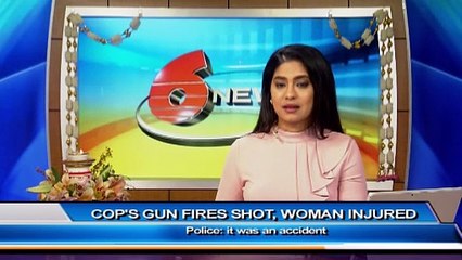 COP'S GUN ACCIDENTALLY FIRES, WOMAN INJURED