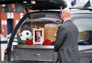 The funeral cortege for Albion fan Mark Townsend passes the Hawthorns.