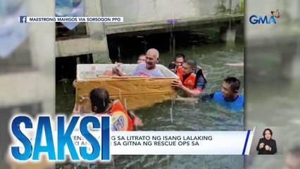 Netizens, naantig sa litrato ng isang lalaking malaki ang ngiti sa gitna ng rescue ops sa Sorsogon | Saksi