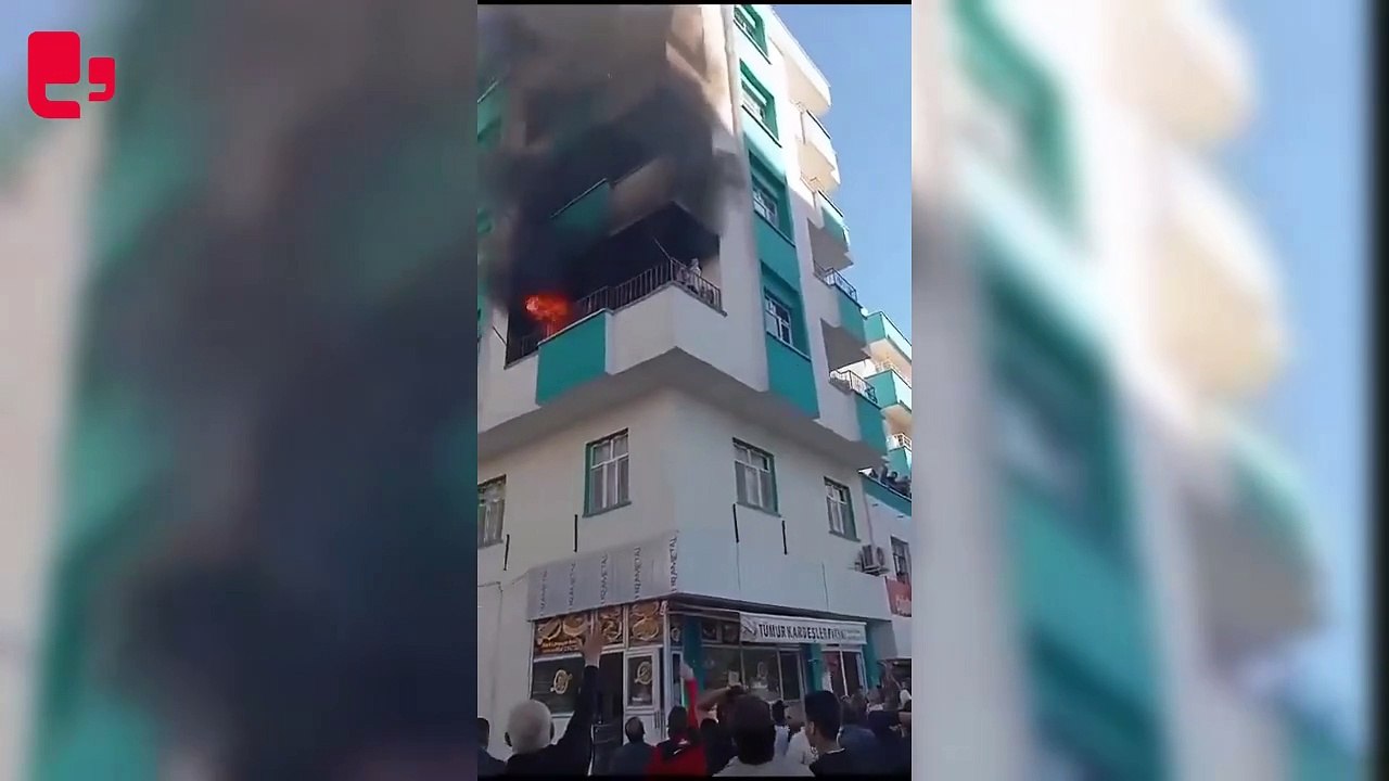 Yangında mahsur kalan iki çocuk battaniyeye atlayarak kurtuldu