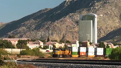 gettyimages-142773125-640_adppMS Union pacific freight train in curve moving with containers / Calimesa, California, United States - HD stock video