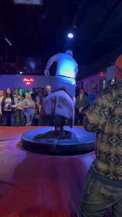 Dad falls off mechanical bull!!!!