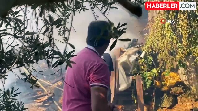 Antalya'da Yangın Paniği: Kadın Evini Kurtarmak İçin Hortumla Mücadele Etti