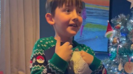 Young champ loses his mind over getting a phone on Christmas