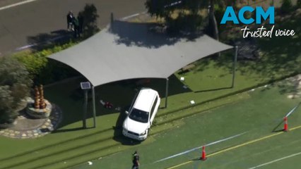 Car crashes through primary school