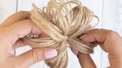 Artist crafts a DIY twine pumpkin that glows perfectly for Halloween