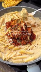 Grilled chicken with creamy alfredo pasta
