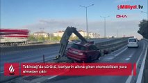Otomobil, bariyerin altına girdi! Mucize kurtuluş