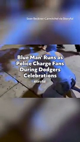 Blue Man' Runs as Police Charge Fans During Dodgers Celebrations