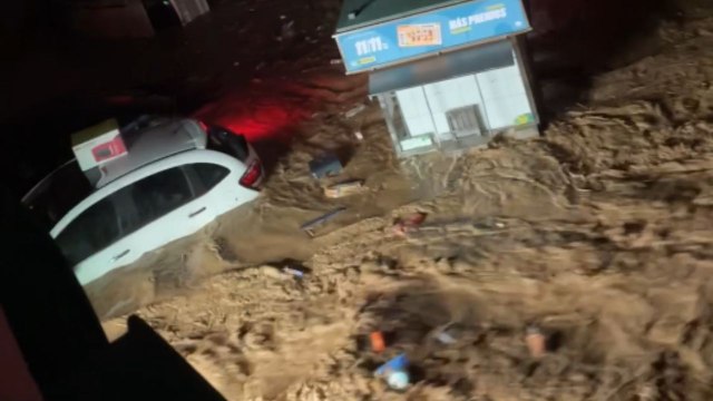 Destructive Valencia flooding captured on video as cars get trapped in rising waters