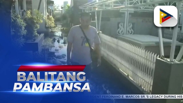 Makeshift bridges and sacks set up for cemetery visitors in Valenzuela