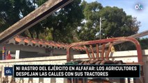 Ni rastro del Ejército en Alfafar: los agricultores despejan las calles con sus tractores