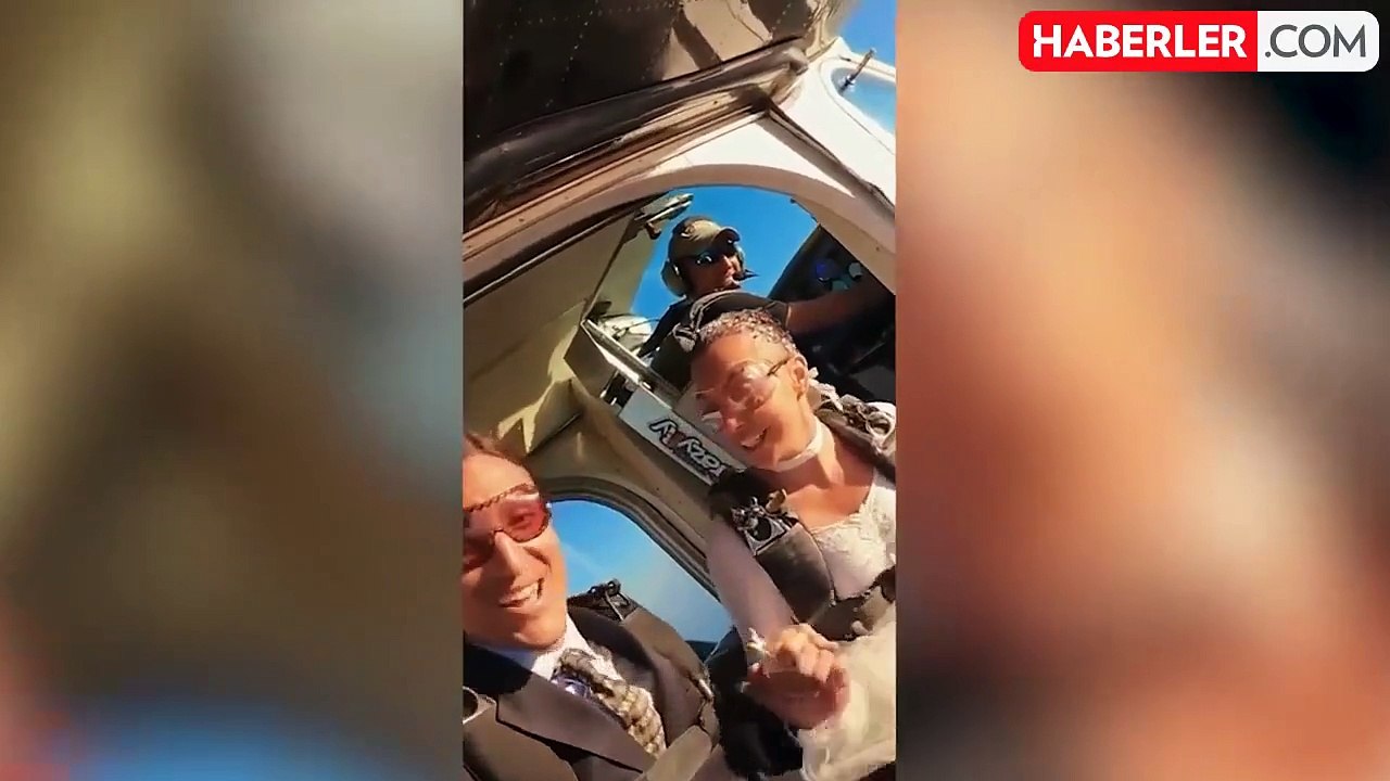 "Dünyanın en çekici paraşütçüsü" gökyüzünde evlendi