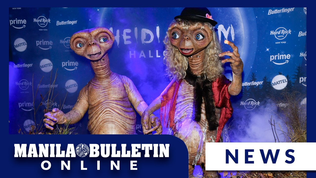 Heidi Klum dresses up as E.T. for annual Halloween party
