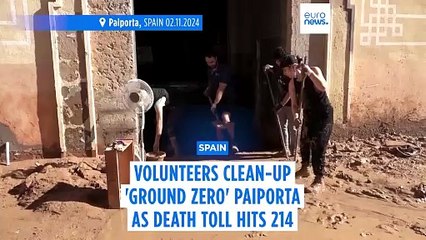 Volunteers clean-up Paiporta as Pedro Sánchez mobilises 10,000 more troops