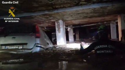 Spain floods: Rescuers wade through building’s chest-high water in search for missing