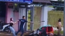 Nam thanh niên cầm rựa đe dọa nữ shipper