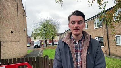 Reporter Sean Gleaves talks to neighbours affected by the suspected gas explosion in Gillett Steet, Preston